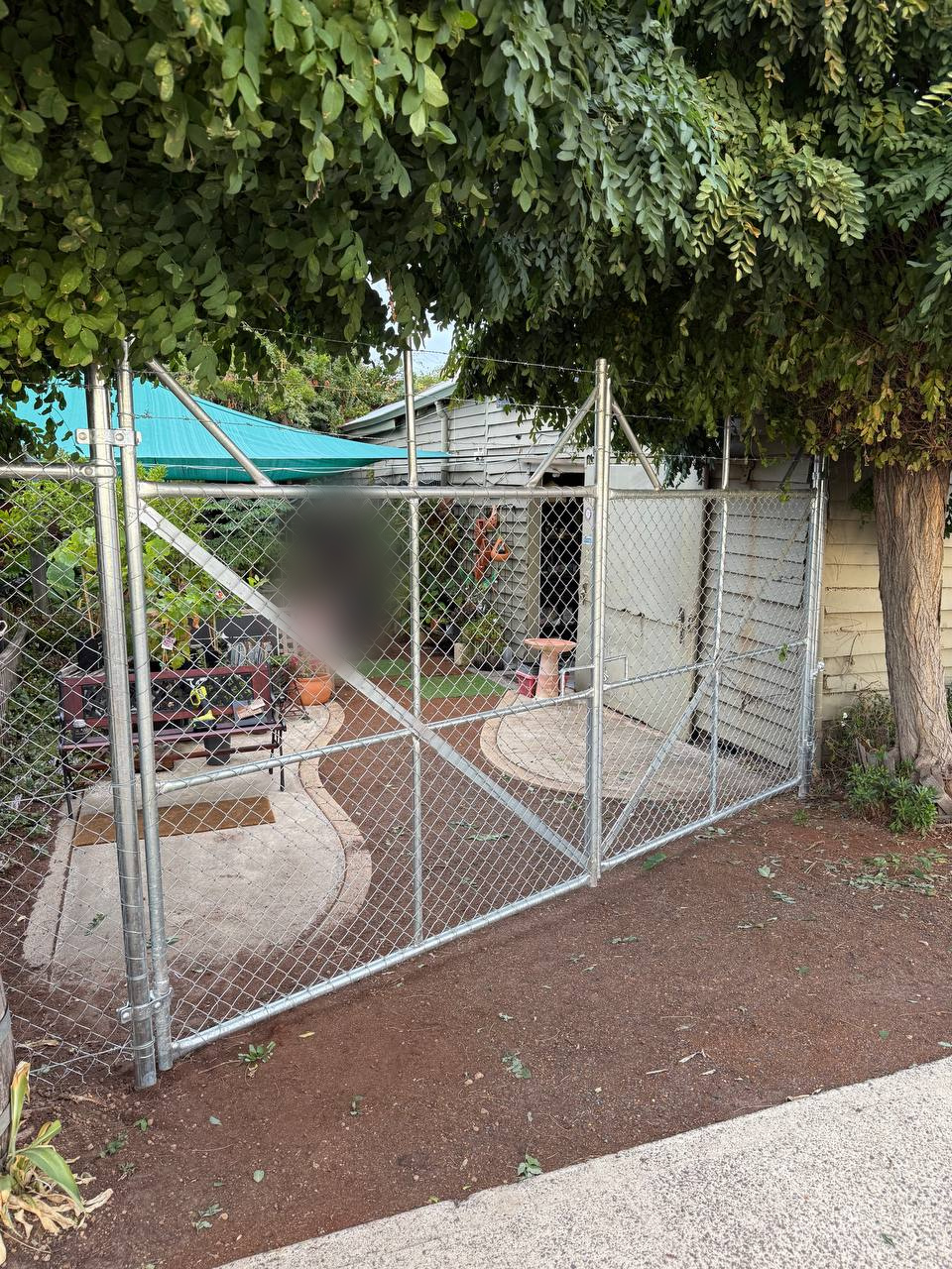 Galvanised chain-link double gates with diagonal bracing
