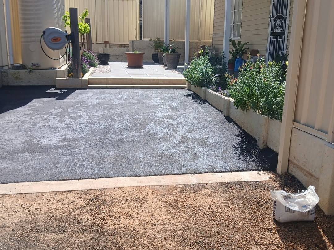 Finished result: new garden beds and paved area